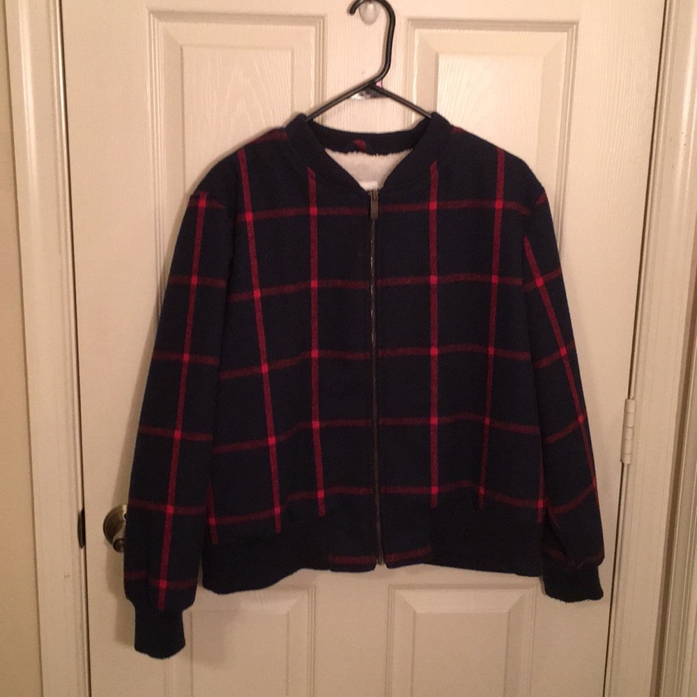 Navy blue and red bomber jacket.